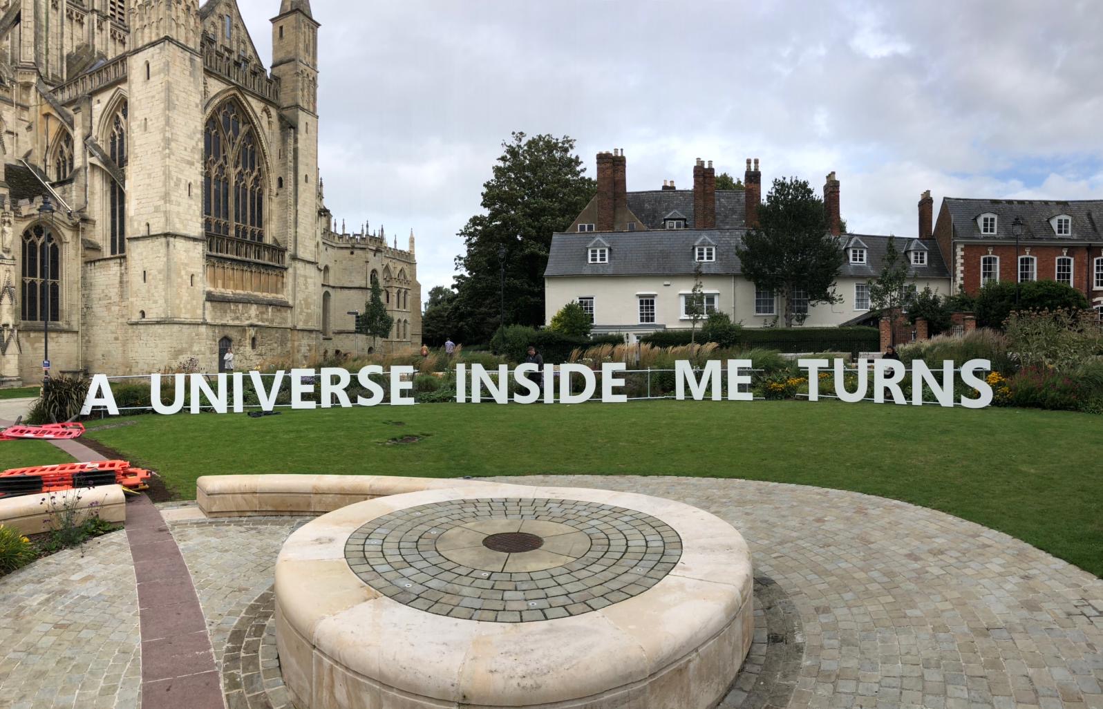 Giant letters 'A Universe Inside me Turns'