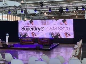 Stage and AV screen set up for a corporate event