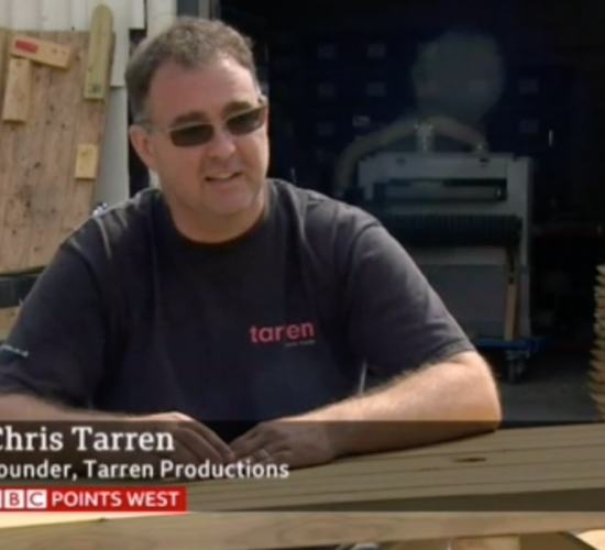 Man sitting at bench for TV interview